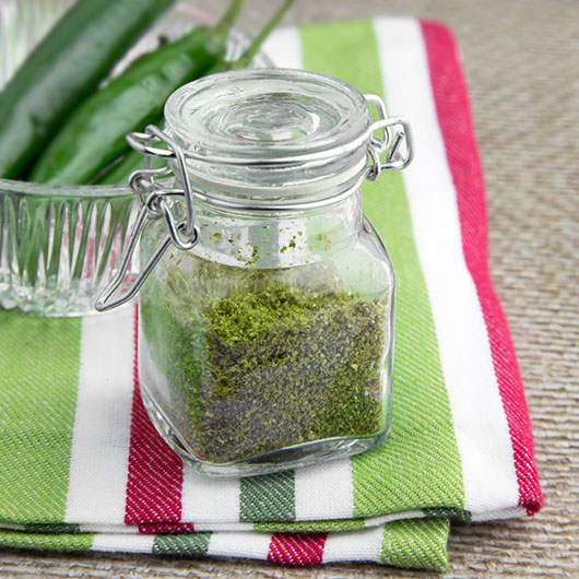 DIY Dehydrated Green Chilli Powder @OmNomAlly #Raw option, #glutenfree, #paleo, #vegan. Green chilli powder is one of those ingredients you'll hardly ever see in the shops - so just make your own! Packing a vibrant, spicy punch, try this Home-made Green Chilli Powder in your dehydrator.