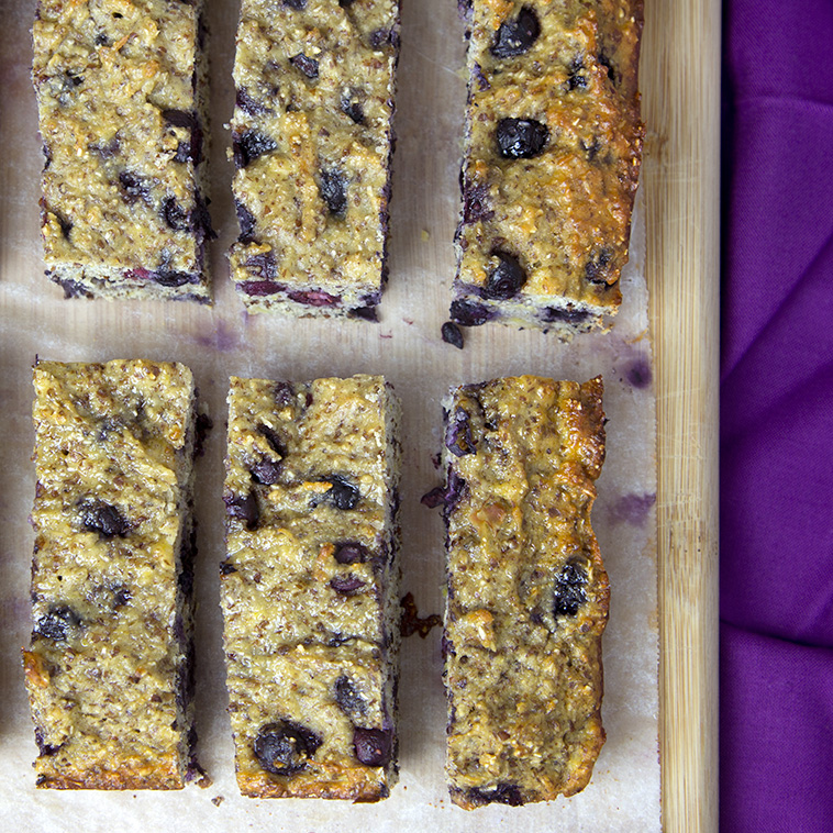 Banana & Blueberry Oatmeal Protein Bars @OmNomAlly - Save your money and eat these protein-rich, nutrient-dense protein bars to fuel you up after a workout or tide you over during the mid-morning/afternoon energy slumps.