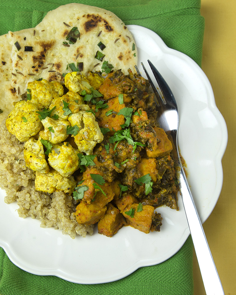 Chili Smothered Pork Vindaloo with Kale + Baked Curried Cauliflower Florets | A fiery-hot pork dish, this amazing Goan-style vindaloo curry is made by smothering the pieces of meat in a homemade garlic-chilli sauce before braising until tender. @omnomally