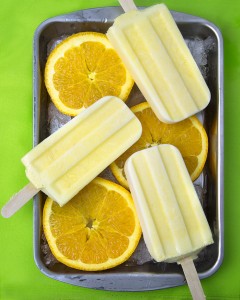 Orange Creamsicle Pops (Vegan, Paleo) @OmNomAlly | Unlike packaged Creamsicles, these creamy orange popsicles have five easy to find, easy to pronounce, nourishing ingredients - with no CRAP!
