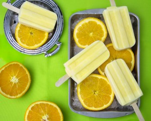 Orange Creamsicle Pops (Vegan, Paleo) @OmNomAlly | Unlike packaged Creamsicles, these creamy orange popsicles have five easy to find, easy to pronounce, nourishing ingredients - with no CRAP!