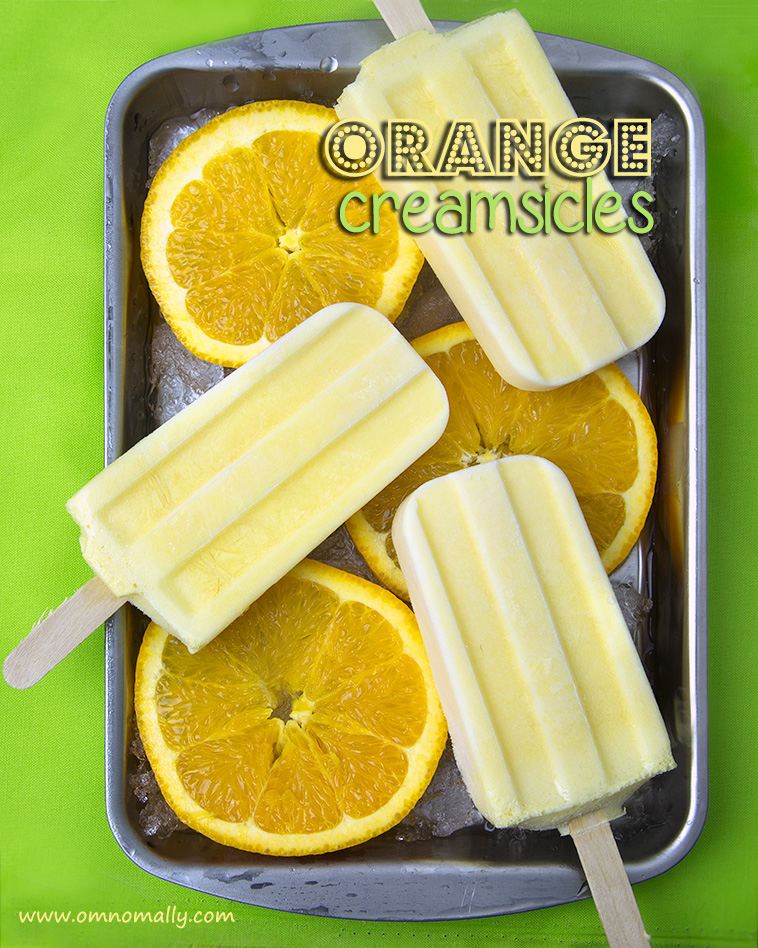 Orange Creamsicle Pops (Vegan, Paleo) @OmNomAlly | Unlike packaged Creamsicles, these creamy orange popsicles have five easy to find, easy to pronounce, nourishing ingredients - with no CRAP!