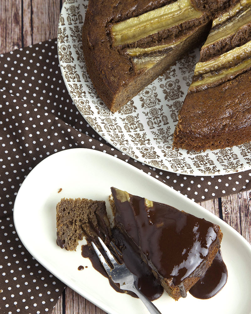 Wholegrain Chocolate Banana Cake with 3-Ingredient Chocolate Syrup @OmNomAlly | This Chocolate Banana Cake is dense, moist and fudgy thanks to the addition of mashed banana, with the amazing flavour of real banana and chocolate infused in every crumb.