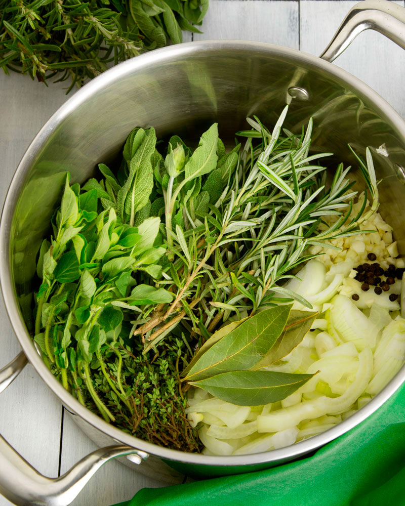 Organic chicken soup with bone broth & fresh garden herbs + home