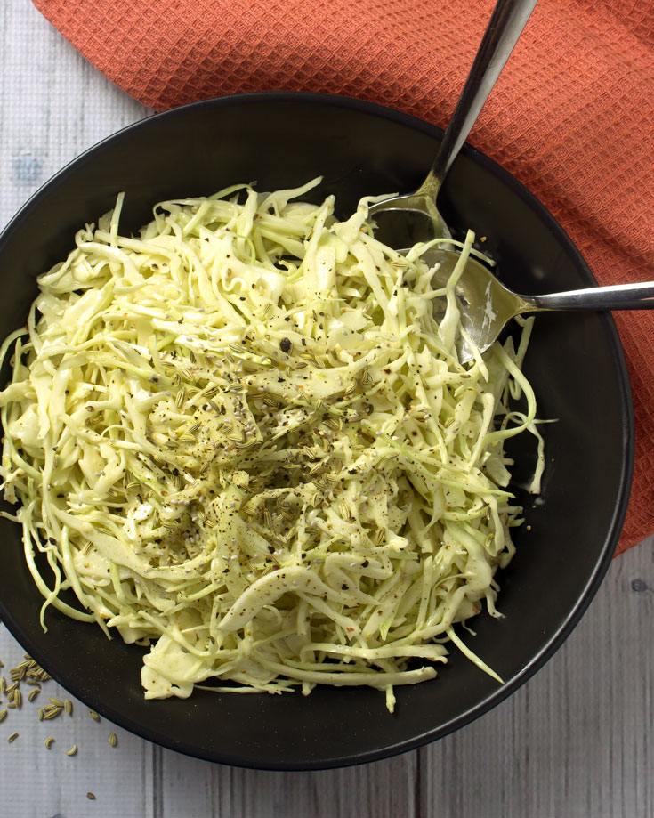 Low Carb Green Cabbage & Fennel Coleslaw - This fast low carb slaw is gluten-free, dairy-free and paleo, with the gut healing benefits of raw apple cider vinegar. 