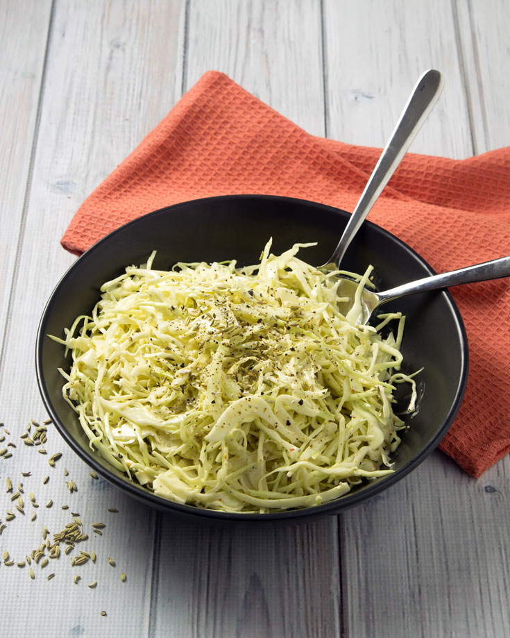 Low Carb Green Cabbage & Fennel Coleslaw - This fast low carb slaw is gluten-free, dairy-free and paleo, with the gut healing benefits of raw apple cider vinegar. 